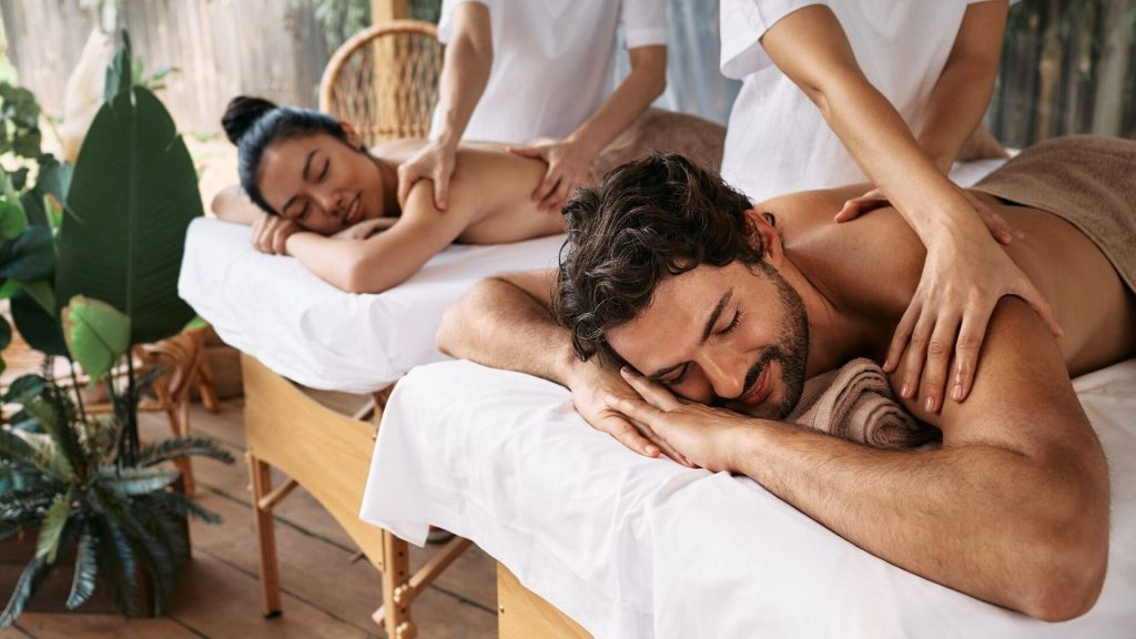 couple-getting-a-massage-at-a-resort-1920×1080